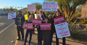 RNs Demand Patient Safety at Carondelet St Marys Amid Retaliation - USA Works Nurses outside holding signs