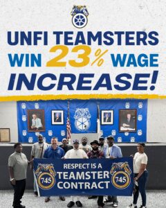 Group of people holding a blue banner that reads 'Respect is a Teamster Contract' at a union event, with a blue backdrop and portraits behind them.