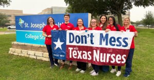 RNs and Staff Plan Vigil Amid Concerns Over St Josephs - USA Works - USA Works Group of nurses outside St. Joseph Health holding banner "Don