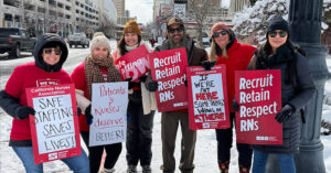 Saint Marys RNs to Picket Against Unlawful Nurse Terminations - USA Works - USA Works Group of nurses outside in cold weather clothes holding signs